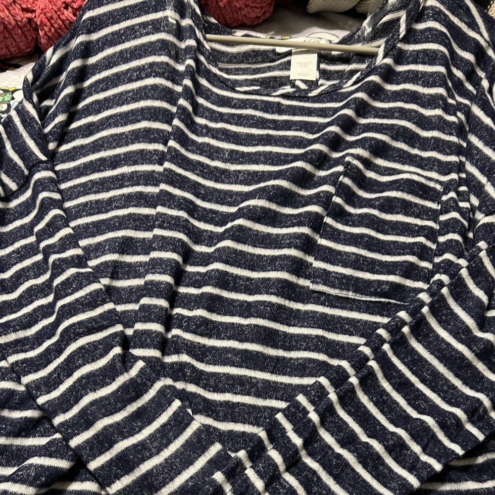 Women’s sweater with button down half back open